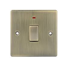D-SP20DPN-ABM 20A D Switch with Neon Metal Insert Antique Brass